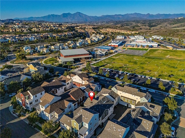 bird's eye view featuring a residential view and a mountain view