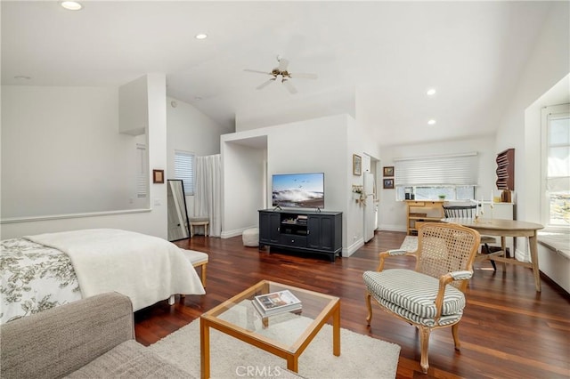 bedroom featuring lofted ceiling, baseboards, recessed lighting, and wood finished floors