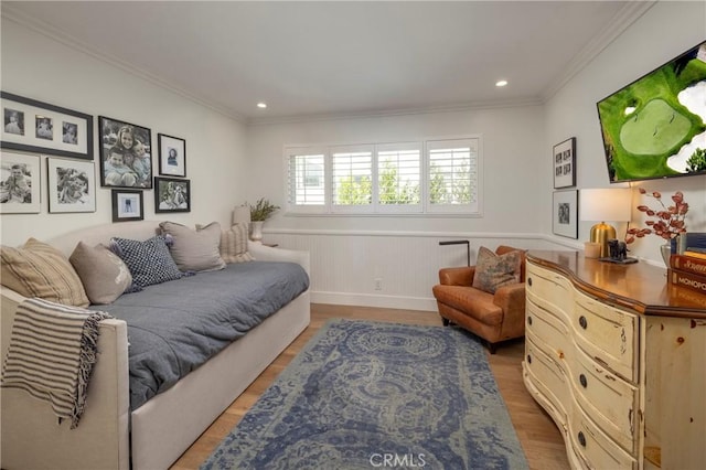 bedroom featuring recessed lighting, crown molding, and wood finished floors