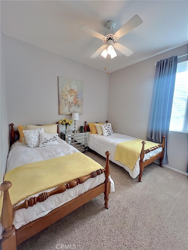 bedroom featuring carpet and ceiling fan