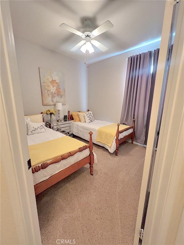 bedroom featuring ceiling fan