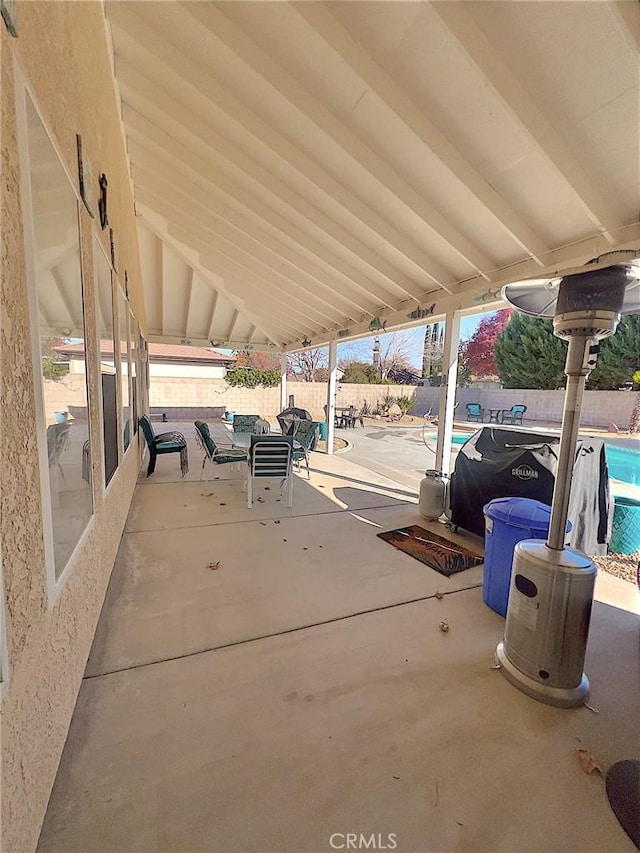 view of patio / terrace featuring a fenced backyard and a fenced in pool