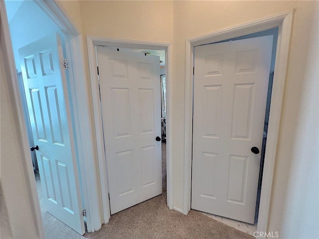 corridor with light speckled floor