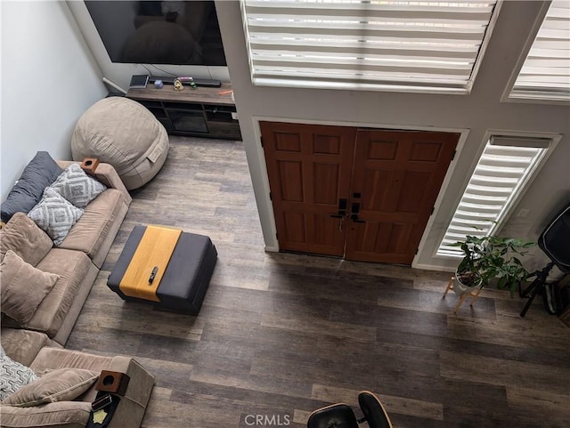 living area with wood finished floors