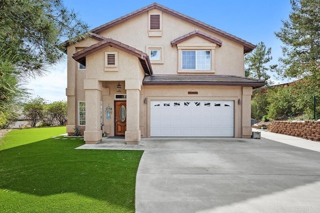 view of front of home with a garage, a tile roof, driveway, stucco siding, and a front yard