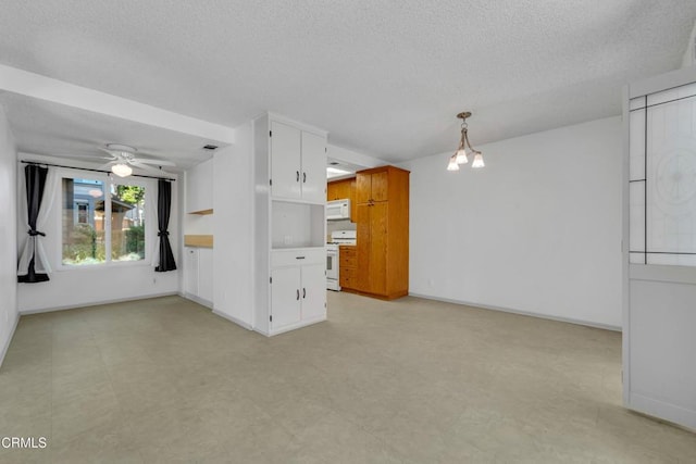 unfurnished living room featuring a textured ceiling, light floors, a ceiling fan, and baseboards