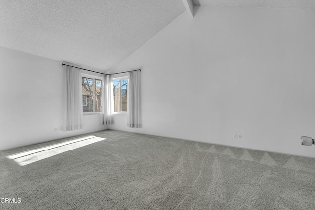 empty room with a textured ceiling, carpet floors, beamed ceiling, and high vaulted ceiling