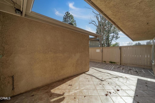 view of patio with fence