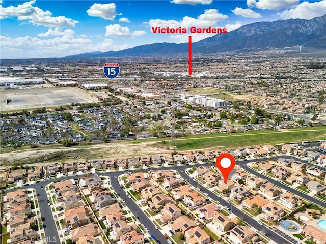 aerial view with a residential view and a mountain view