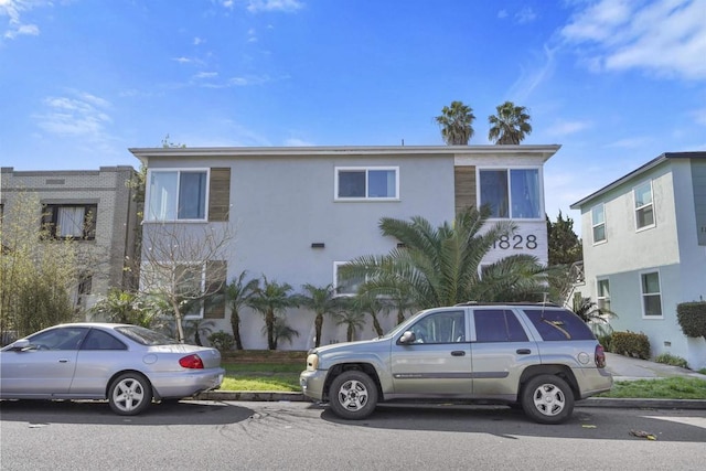 view of front of house featuring stucco siding