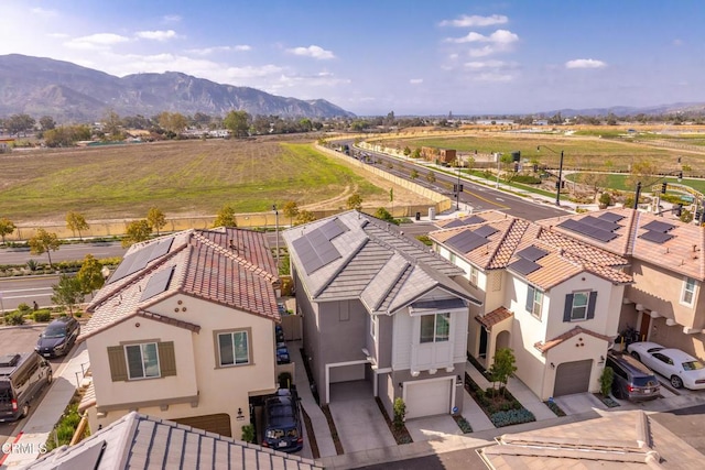 bird's eye view with a residential view and a mountain view