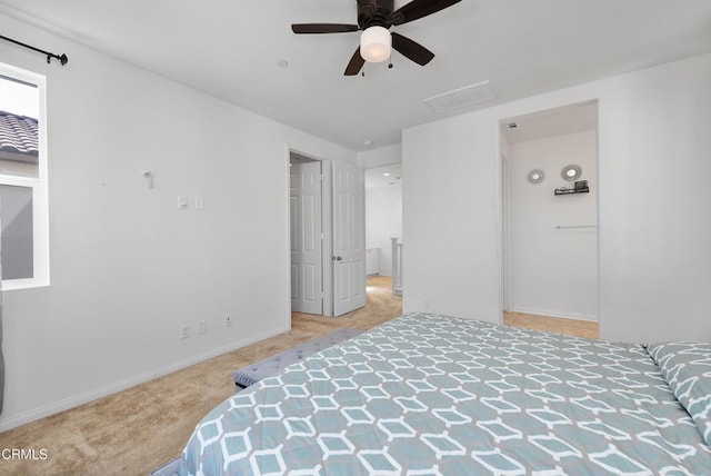 bedroom featuring carpet floors, ceiling fan, and baseboards