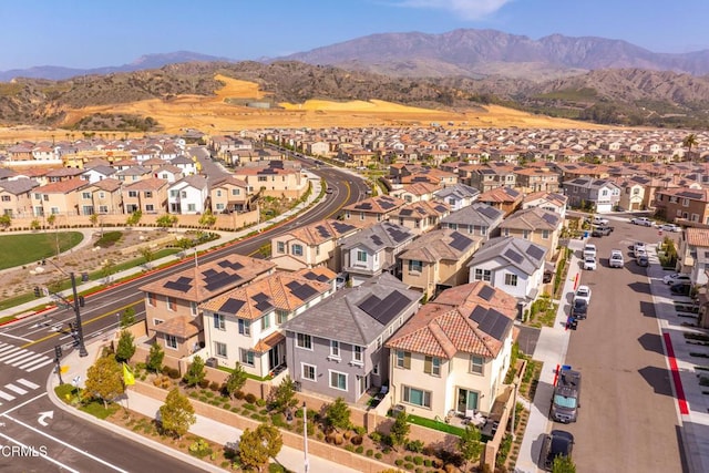 aerial view featuring a mountain view and a residential view