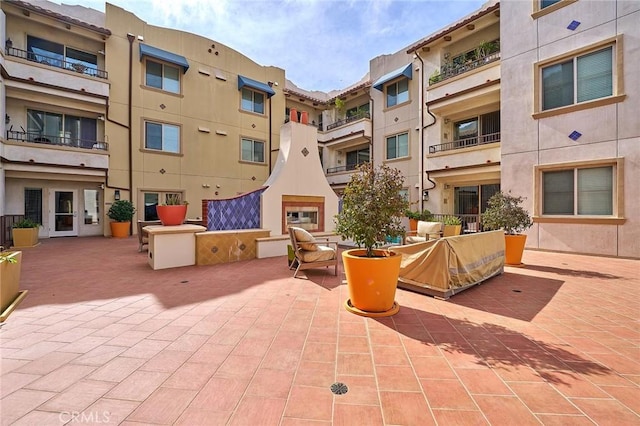 view of home's community featuring a patio area