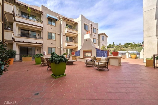 view of patio / terrace with a fireplace