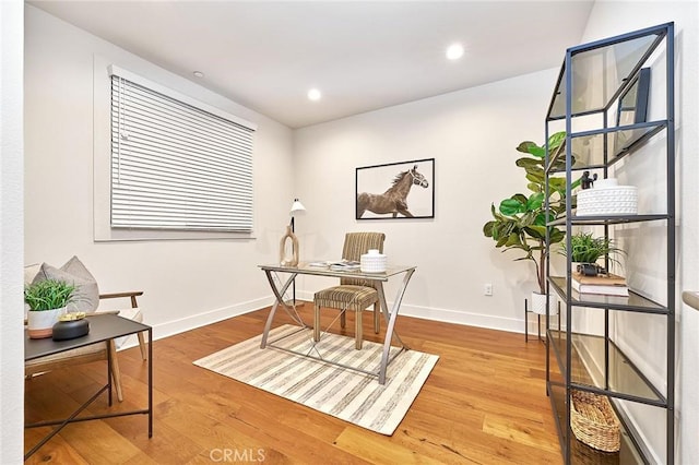 home office with light wood-type flooring, baseboards, and recessed lighting