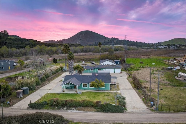 aerial view at dusk with a mountain view