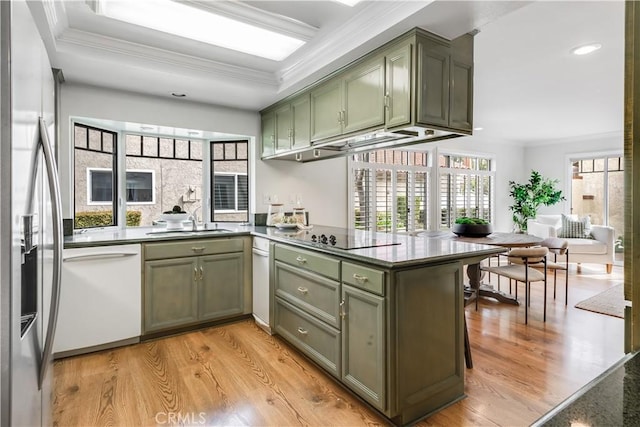 kitchen with green cabinets, ornamental molding, white dishwasher, stainless steel fridge with ice dispenser, and black electric cooktop