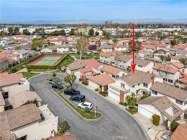 aerial view featuring a residential view and a mountain view