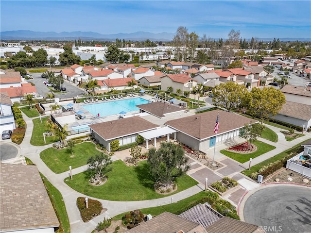 drone / aerial view with a residential view and a mountain view