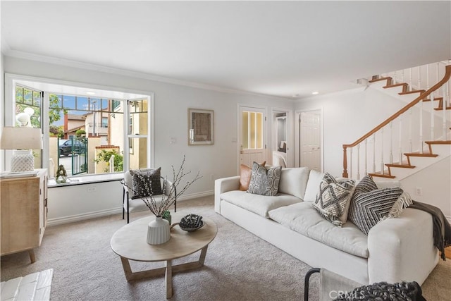 living area featuring ornamental molding, carpet flooring, and baseboards