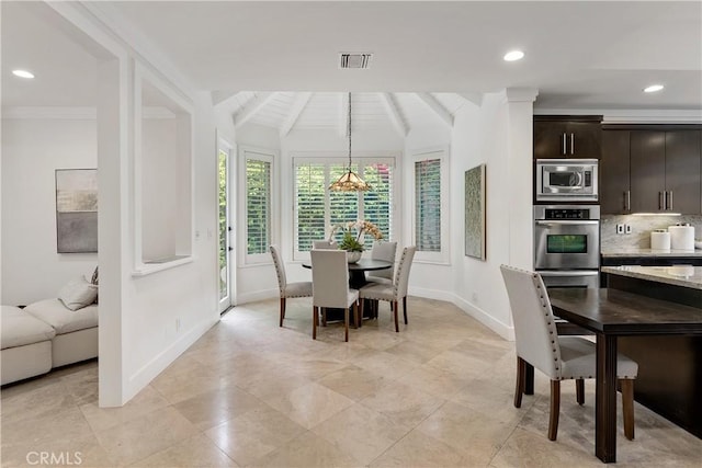 dining space with lofted ceiling with beams, a chandelier, baseboards, visible vents, and recessed lighting