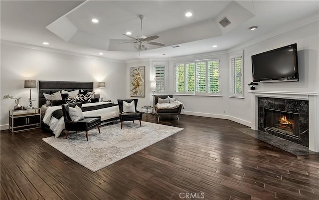 25605 Queenscliff Ct, Calabasas, CA 91302 - bedroom featuring a tray ceiling, crown molding, a fireplace, dark wood-style floors, and recessed lighting