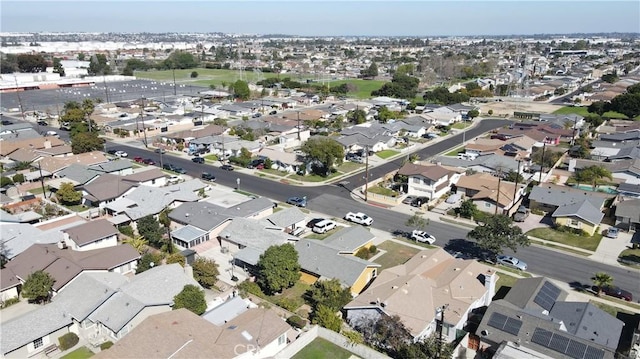 birds eye view of property with a residential view