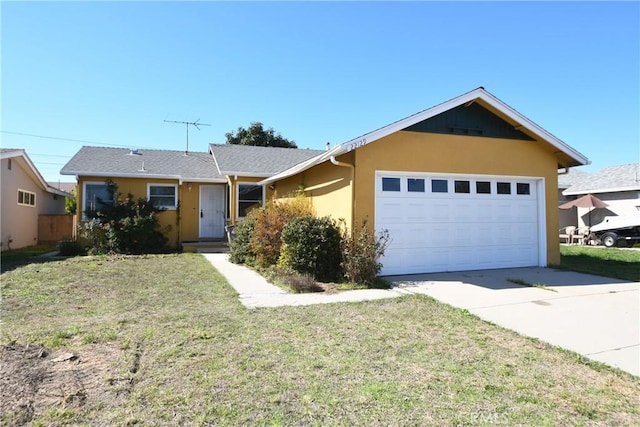 single story home featuring a garage, a front yard, concrete driveway, and stucco siding