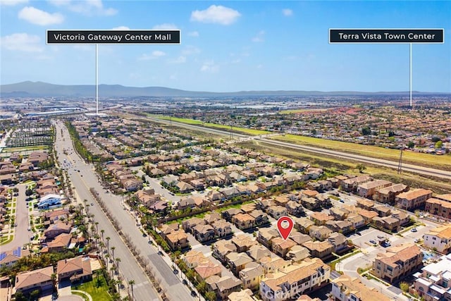 aerial view featuring a residential view and a mountain view