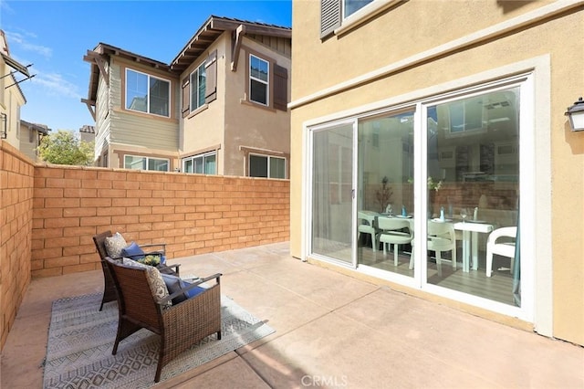 view of patio with fence