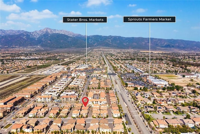 bird's eye view featuring a residential view and a mountain view