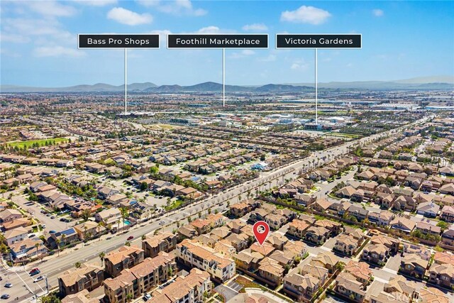 aerial view with a residential view and a mountain view