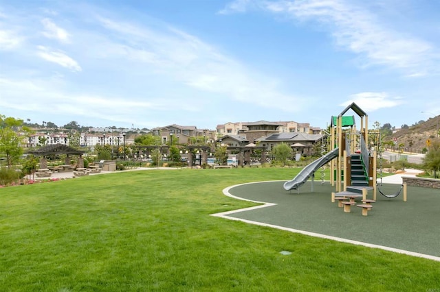 communal playground with a lawn