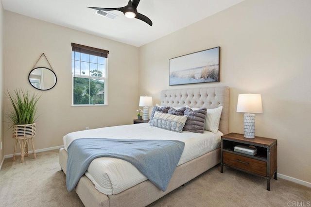 bedroom featuring carpet, visible vents, ceiling fan, and baseboards