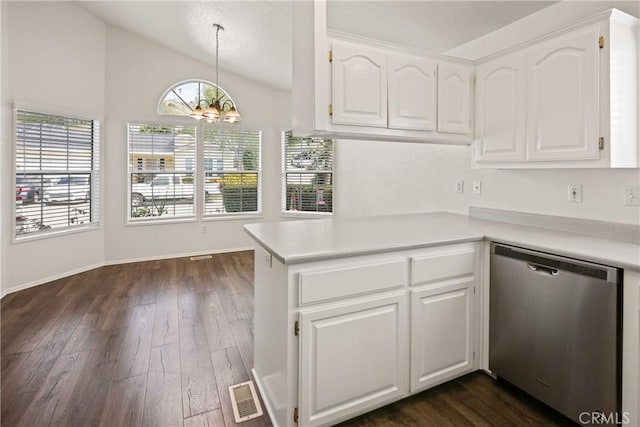 kitchen with dishwasher, vaulted ceiling, visible vents, and white cabinets