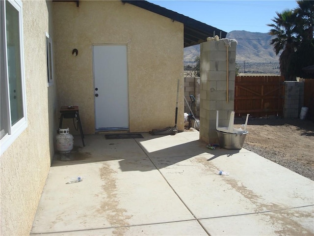 view of patio with fence