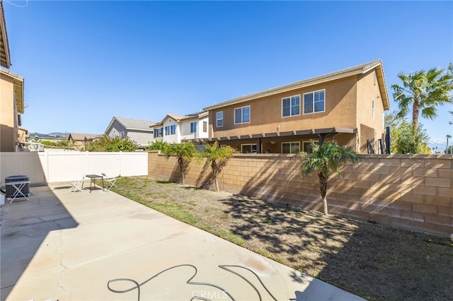 exterior space with a fenced backyard