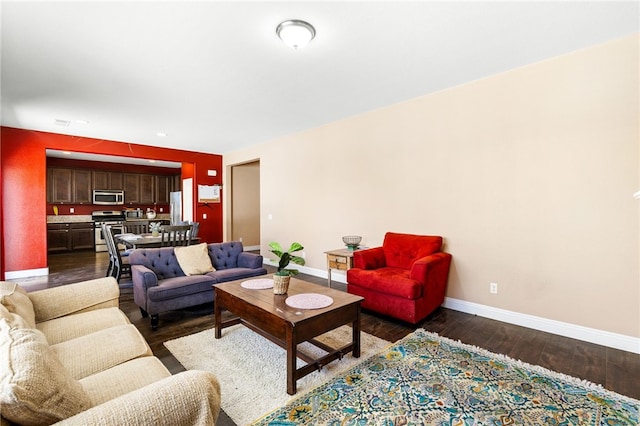 living area with dark wood-style floors and baseboards