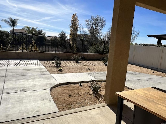 view of patio with a fenced backyard