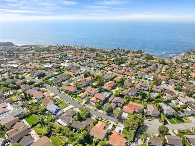 birds eye view of property featuring a residential view and a water view