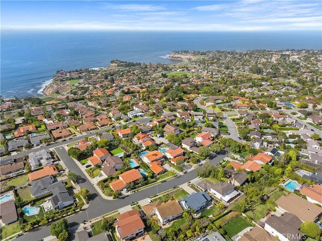 bird's eye view featuring a water view and a residential view