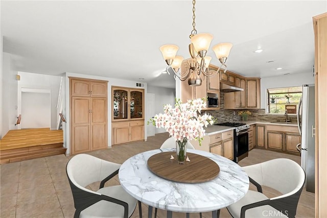 dining space with a chandelier, light tile patterned flooring, visible vents, and recessed lighting