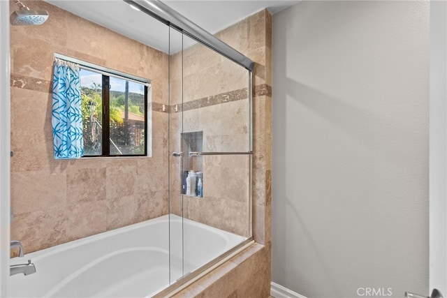 full bath featuring tiled shower / bath combo