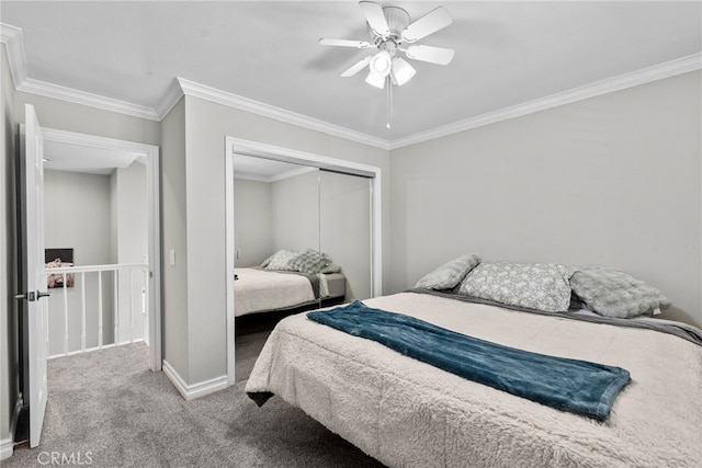 bedroom featuring ceiling fan, baseboards, ornamental molding, a closet, and carpet