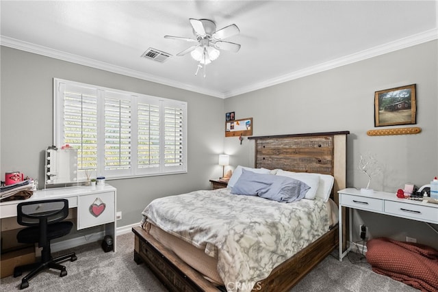 carpeted bedroom featuring baseboards, visible vents, and crown molding