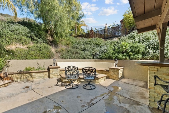 view of patio with fence