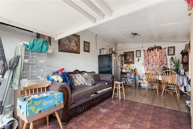 living room with beam ceiling