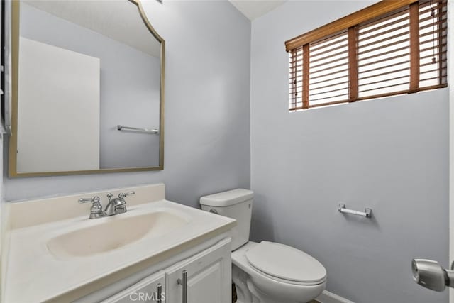 20234 Cohasset St Unit 11, Winnetka, CA 91306 - half bath with toilet, vanity, and baseboards