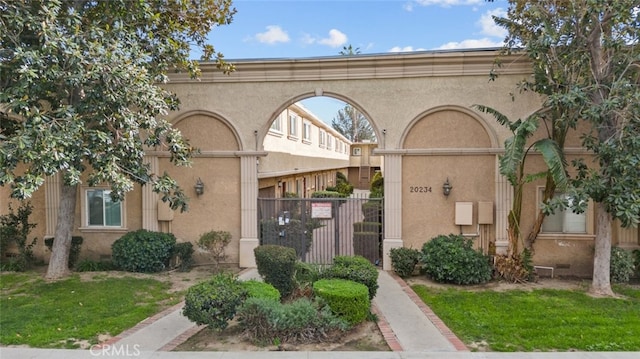 20234 Cohasset St Unit 11, Winnetka, CA 91306 - view of building exterior with fence